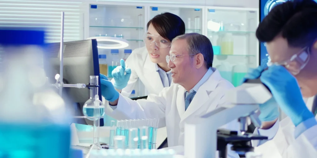 Scientists reviewing data and test samples in a modern lab providing professional chemical services and research solutions.