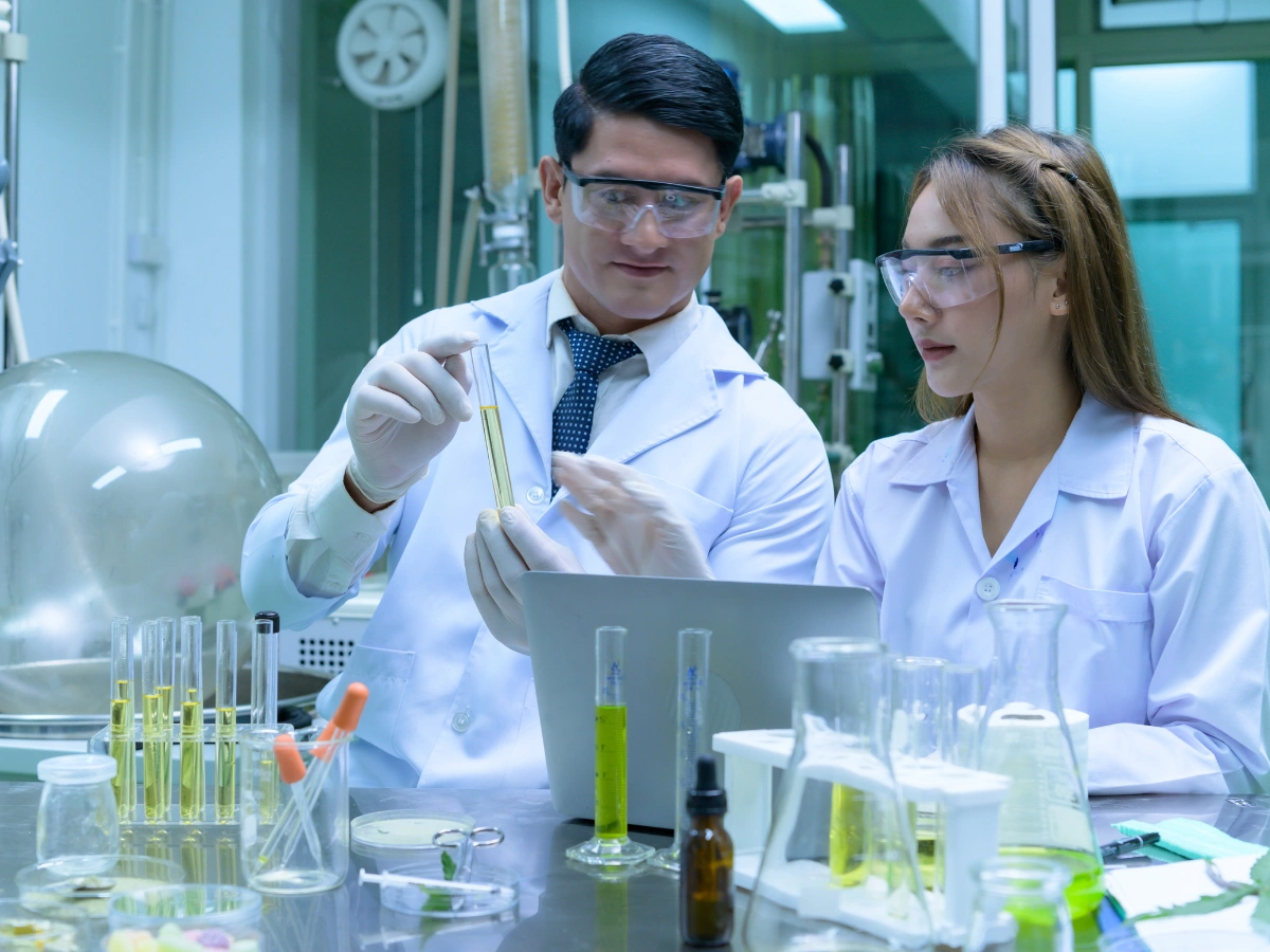 Nitrocellulose Supplier in Pakistan with scientists analyzing chemical samples in a modern laboratory setting